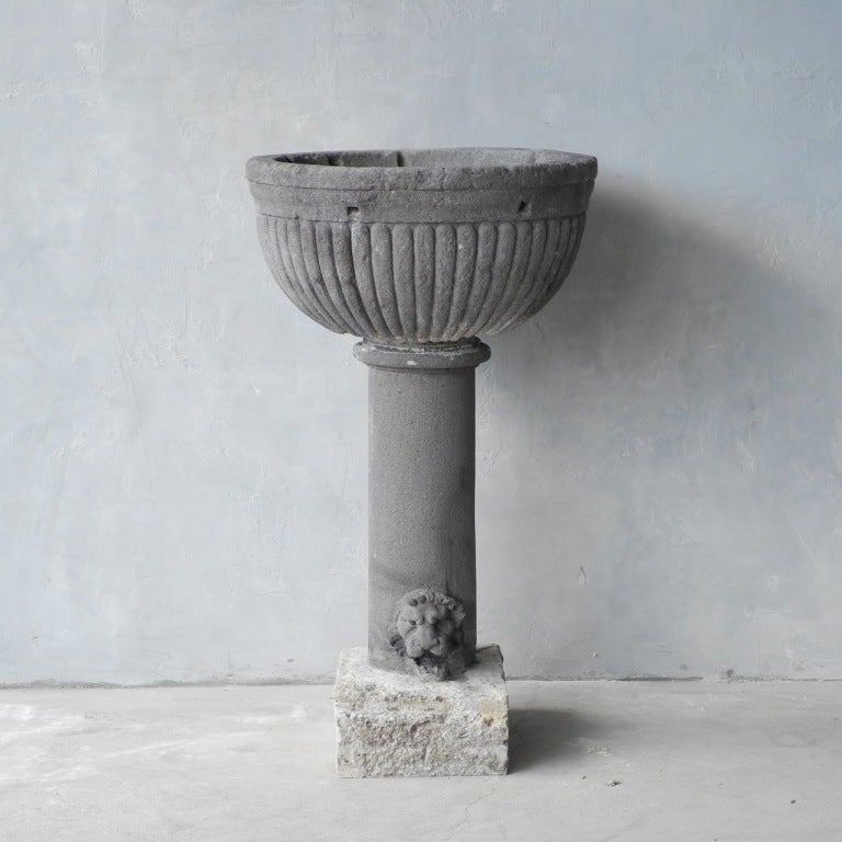 Late 17th c. Font from a Belgian Castle near Brussels. It is believed the stone originally came from Volvic, France