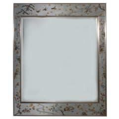 LaBarge eglomise hand painted mirror with gold and silver leaf motif, c. 1970