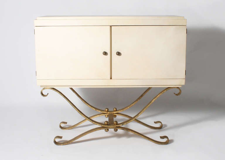 Parchment commode on gilded iron base