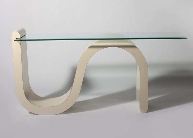 Ivory laminate console table in the style of Karl Springer