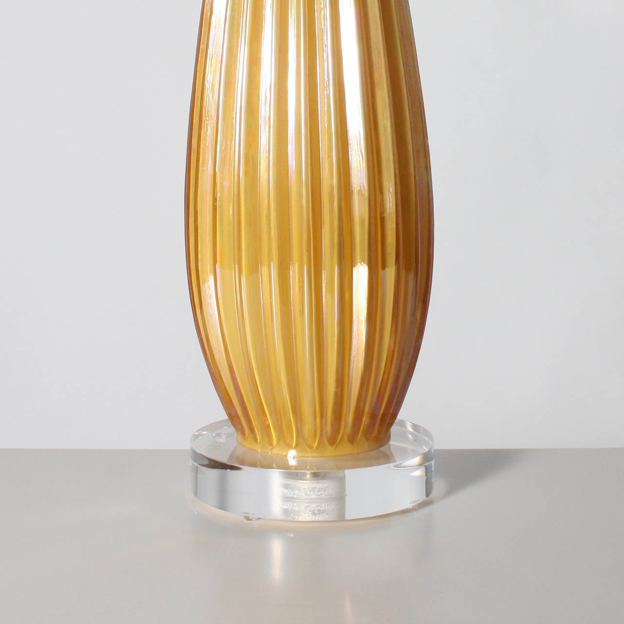 Large Seguso butterscotch Murano lamp with an iridescent shimmer. Off-white pongee shade. 3 way socket, 50/100/150 watt. Brass hardware. Lucite base. Crystal ball finial. Gold twisted cording.
  