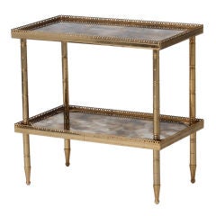 Silver over copper gallery table with eglomise mirrored shelves