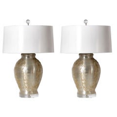 Pair of resin spun silver lamps