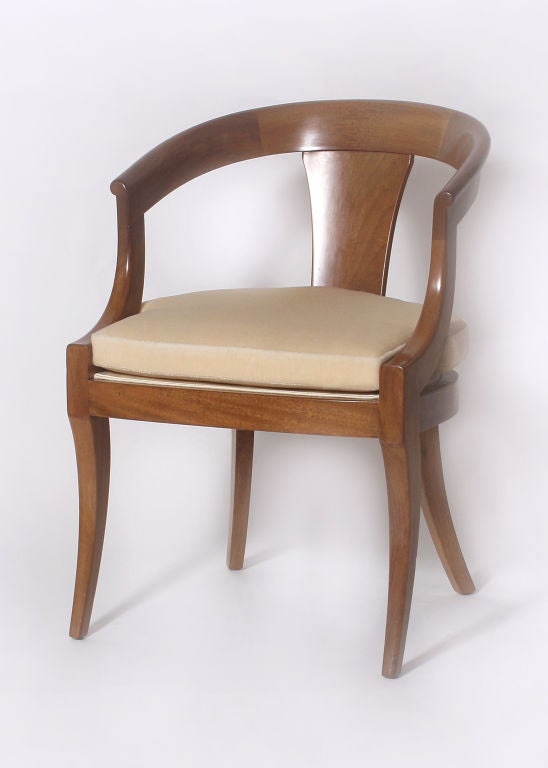 Pair of walnut barrel chairs
