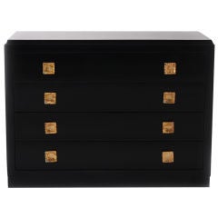 Black lacquered commode with gold leaf pulls