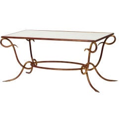 Hand forged gold leaf iron table by Rene Drouet