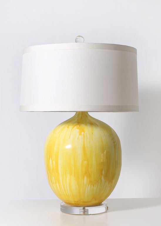 Yellow ceramic drip glaze lamps with Lucite base, custom lacquered shade and silk cord.