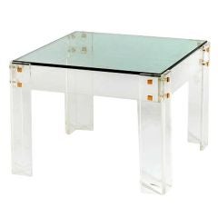 Small square Lucite table with glass top and bronze fittings