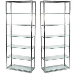Pair of nickel etageres with glass shelves, c. 1960