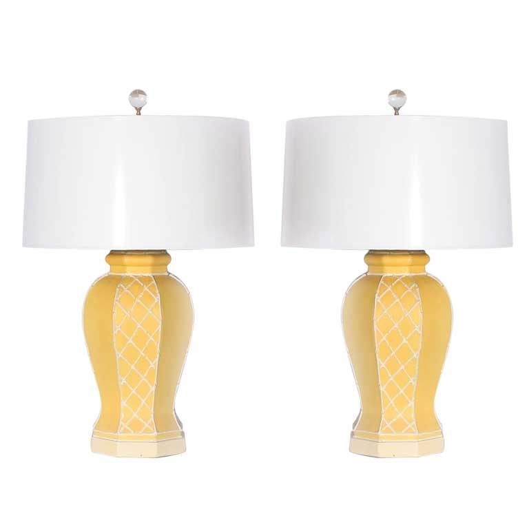 Pair of yellow ceramic lamps with white lattice