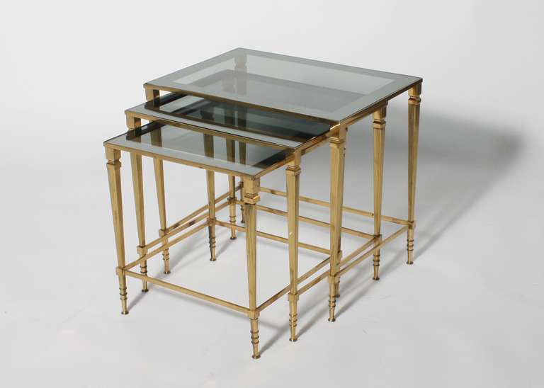 French brass nest of tables with glass tops
19”w X 14”d X 17 1/2”h (Large Table)
16 1/2”w X 14”d X 16 1/2”h (Medium Table)
13”w X 14”d X 15 1/4”h (Small Table)