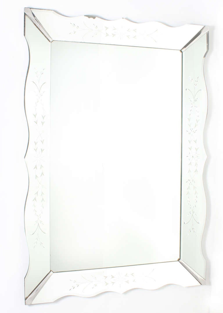 French mirror frame mirror with etching and metal sabots. Wavy edge frame. Slight antiquing on outer frame. Mirror can be hung both vertical and horizontal. 