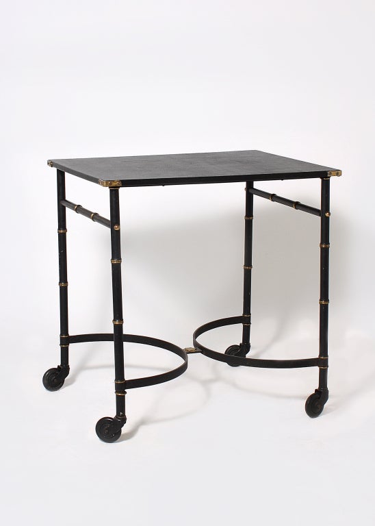Adnet black metal rolling table with leather top, c.1940