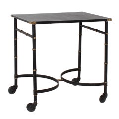Adnet black metal rolling table with leather top, c.1940