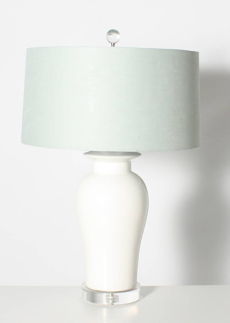 Pair of White Ceramic Lamps with Blue Linen Shades at 1stdibs