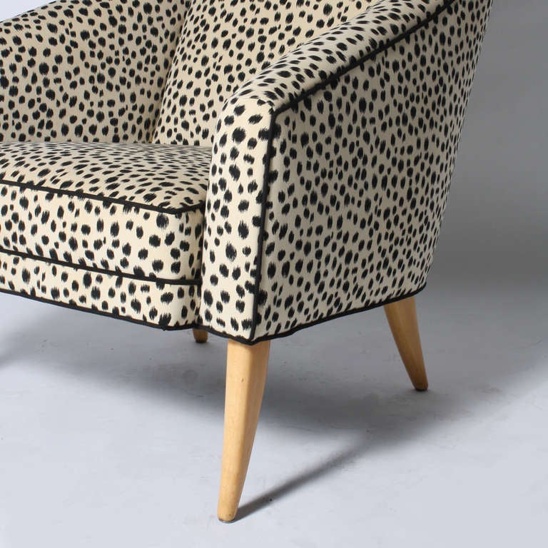Wood Pair of armchairs covered in snow leopard fabric, c. 1960