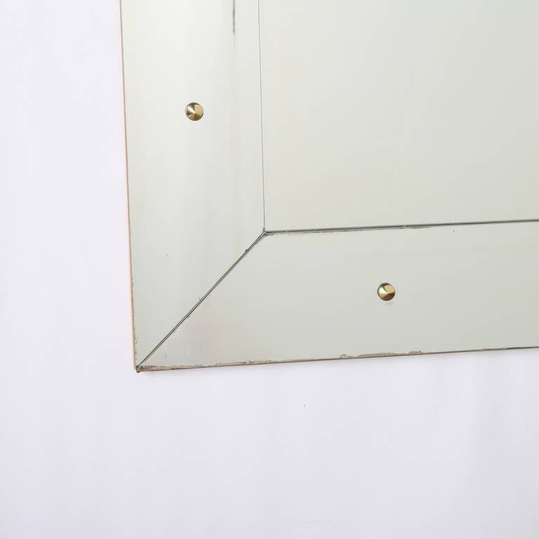 Large Italian Mirror With Brass Rosettes And Wood Frame Circa 1940 French Large Italian Mirror With Brass Rosettes And Wood Frame Circa 1940 For