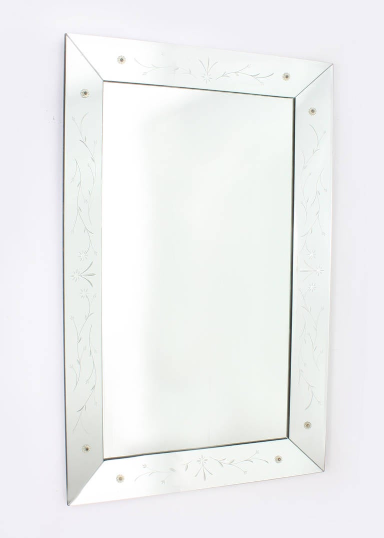 French mirror frame mirror with flower motif and metal rosettes. Glass flower rosettes with no missing rosettes.  Mirror can be hung both vertical and horizontal. 