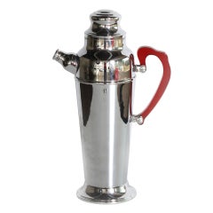 Chrome cocktail shaker with red Bakelite handle, c.1930