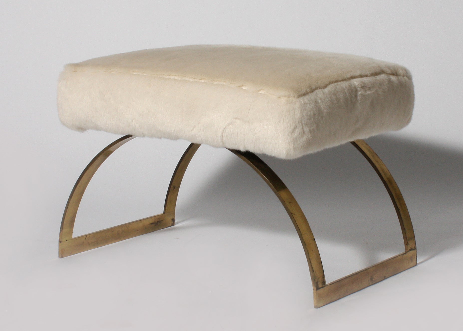 Pair of brass benches with ivory faux fur, c.1970