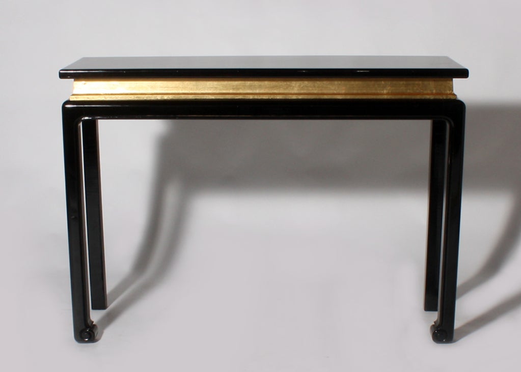 Jansen black lacquer console with gold leaf, c. 1970