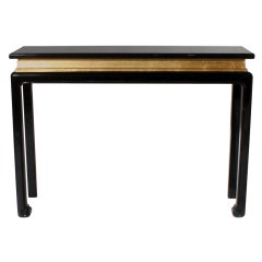 Jansen black lacquer console with gold leaf, c. 1970