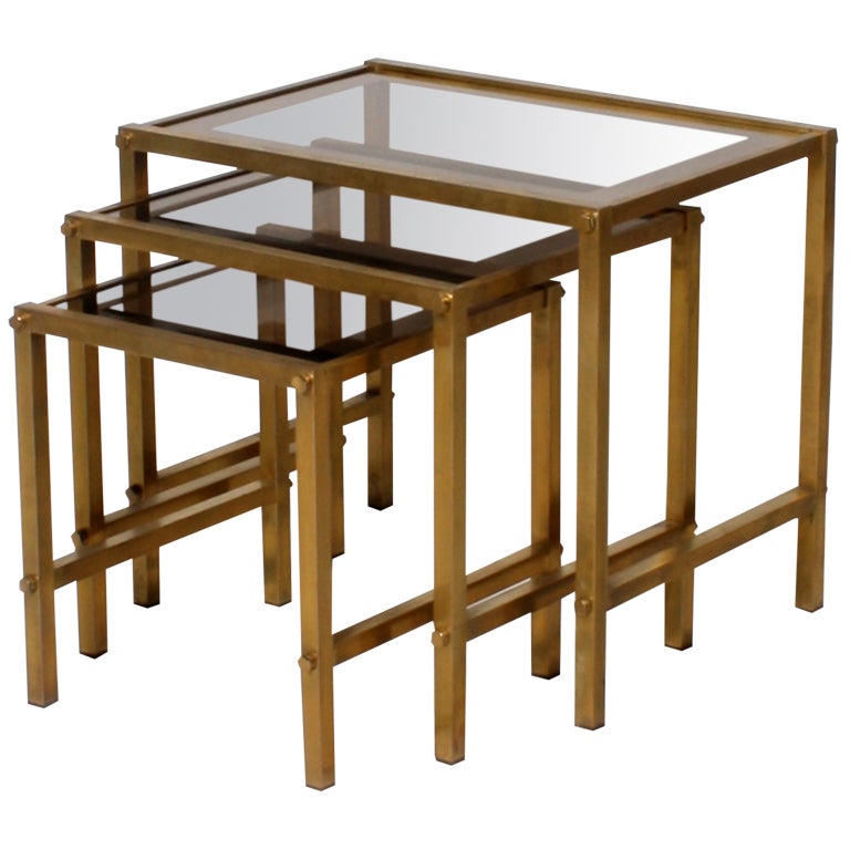 Nest of 3 bronze tables with glass tops, c.1950 at 1stDibs