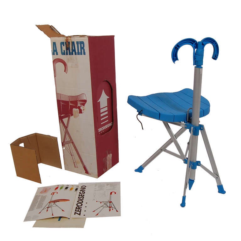 Winner of the Interior Design Magazine award in 1995, this collapsible chair has a molded polyurethane seat and handle.  It looks like a folded up umbrella until the button is pushed and it opens up to a chair.  With original box and brochure.
Made