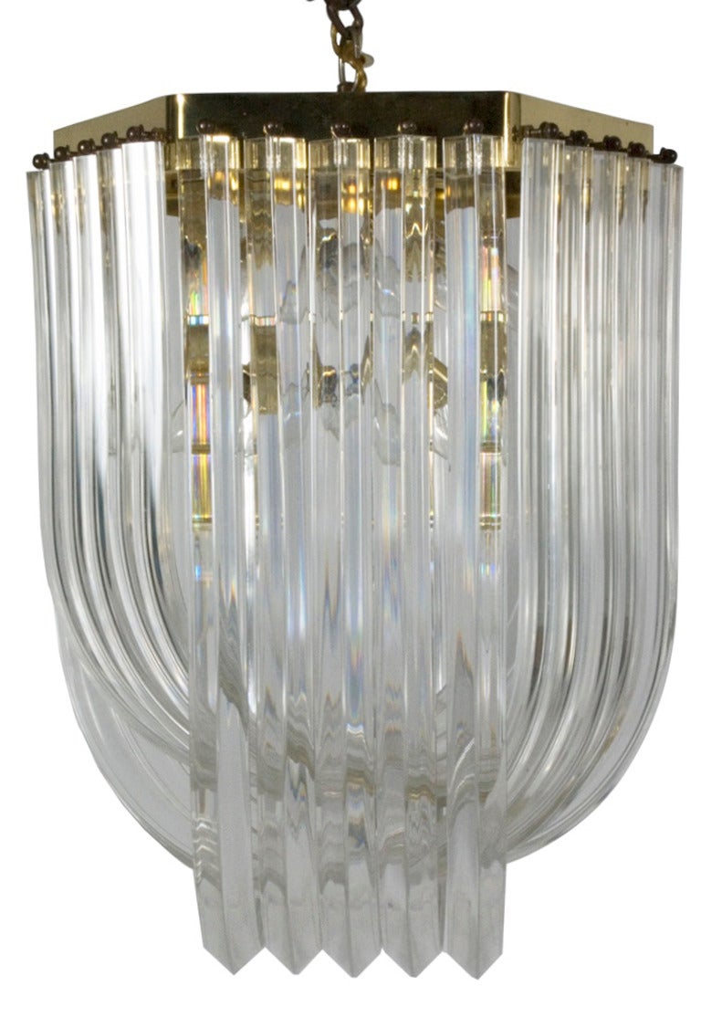 Most likely Italian chandelier, Lucite and brass.