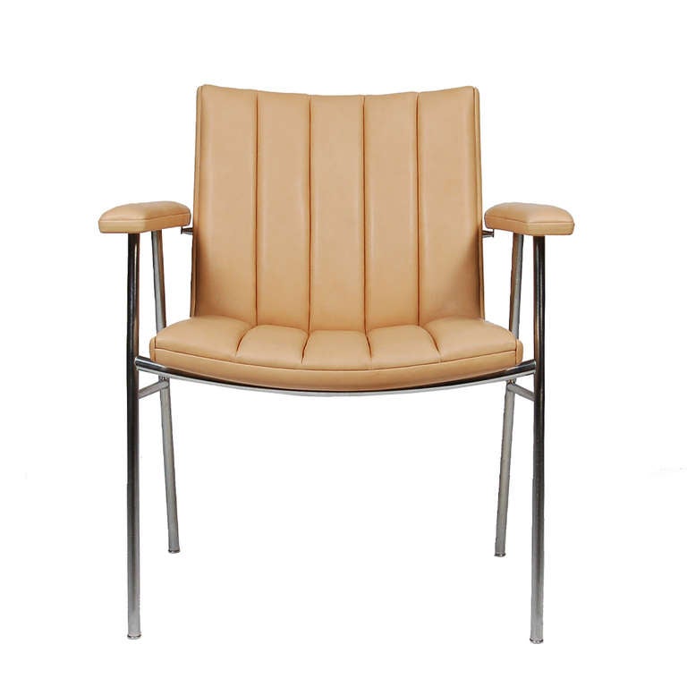 Rare armchair that was designed from left over parts after the production of other chairs. The channeled material on the seat and back were designed to make the most use of left over upholstery fabric and leather.
Made by AP Stolen.
Measure: Arm
