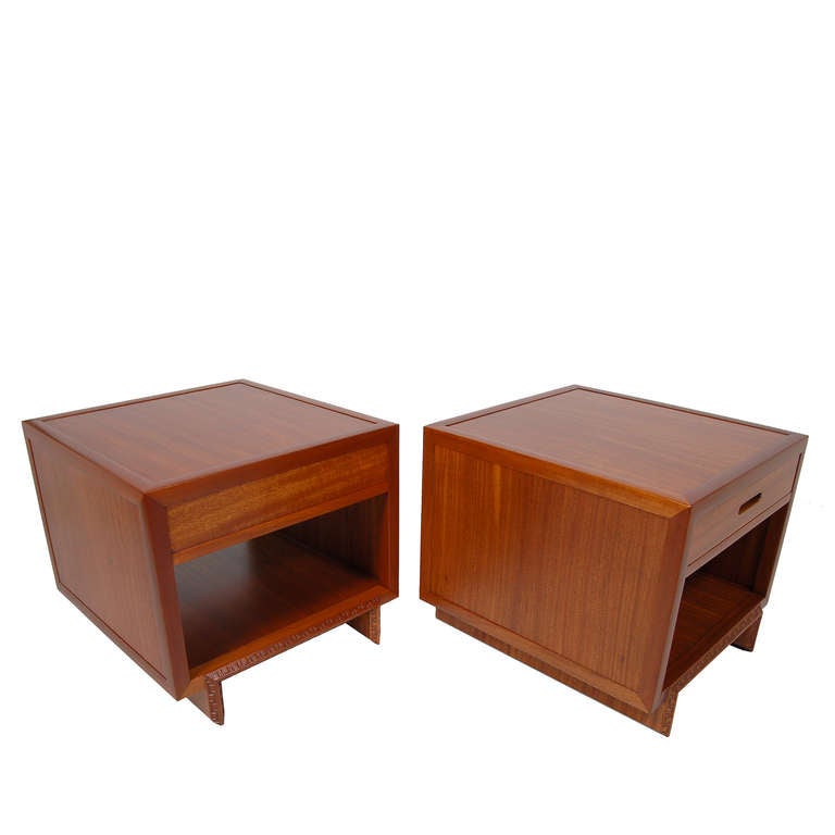 Matching pair of mahogany night tables, with one drawer and open space. Taliesen edge design. Stamped signature and red FLW mark.  Made by Heritage Henredon.