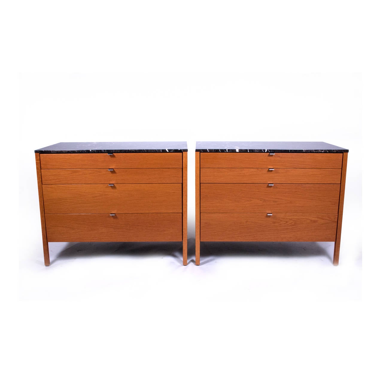 Oak chests of drawers with black marble tops chrome puls.