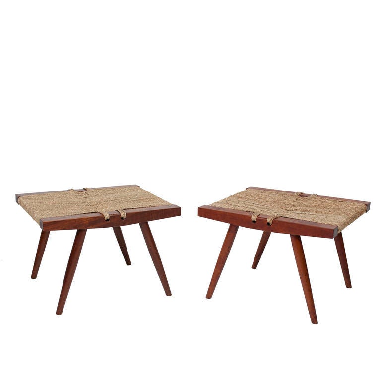 Two solid cherry frame low stools with twisted sea grass seat. Nakashima studio.
Sold individually.