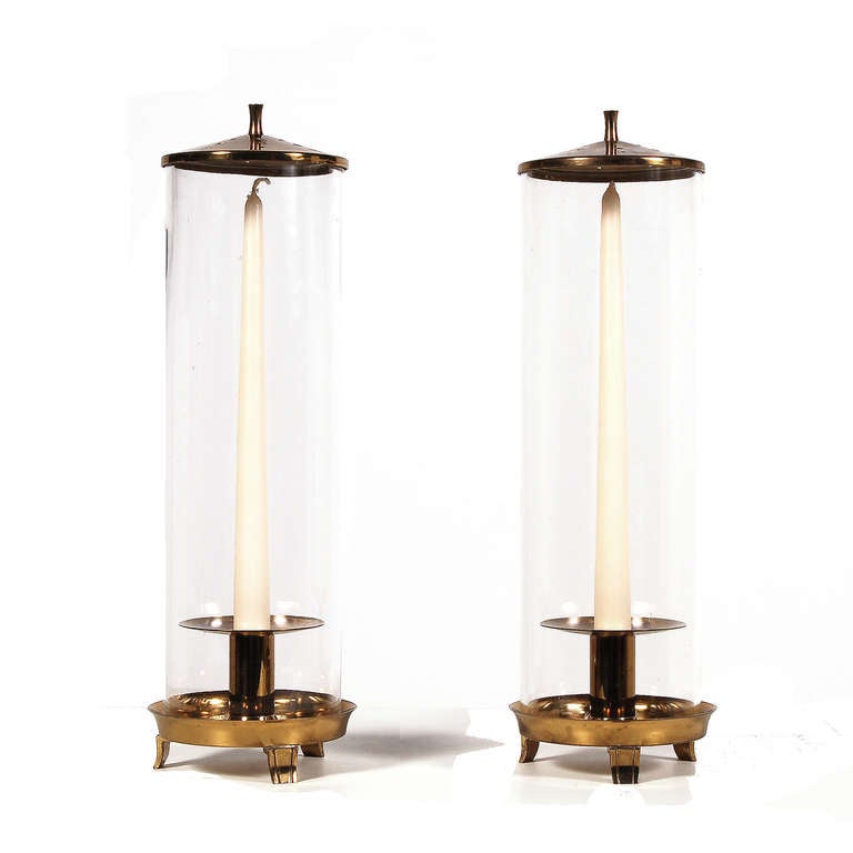 Classic hurricanes with solid brass candleholder, perforated top and footed base. Glass diameter is 4.5