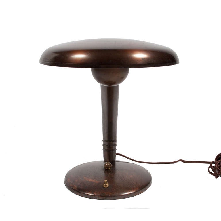 Streamline modern table lamp, American Classic. Bronzed copper; produced by Fairies Manufacturing Co. design by Reinecke and Masterson.