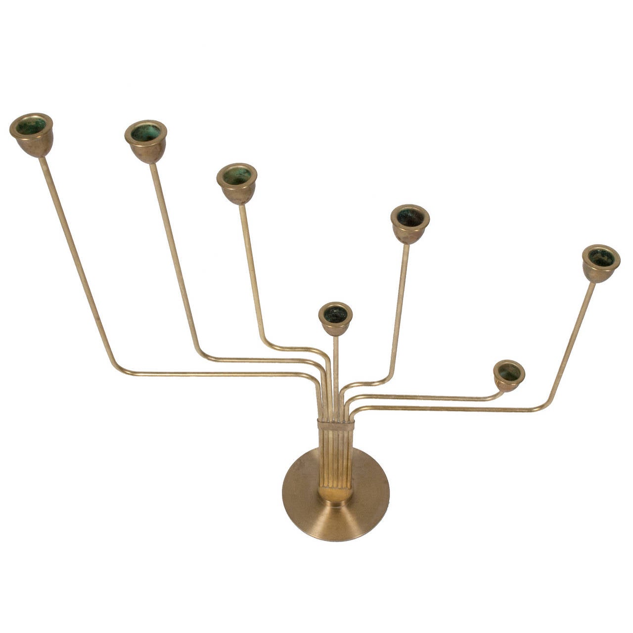 Solid brass candelabrum, created by Hein while living in Argentina. He designed this to remind him of his home in Denmark, since the star constellation is not visible in the southern hemisphere. This is the first model designed of his candelabrum;
