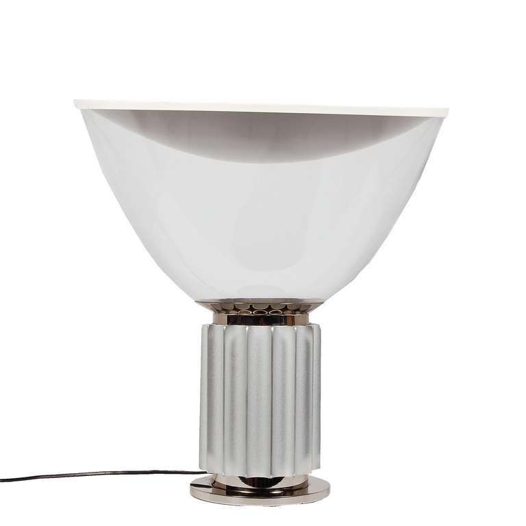 Table lamp providing reflected light from concave spun aluminum reflector with a matte white finish. Light is adjusted by positioning the blown glass diffuser. The base is extruded aluminum in a natural sandblasted finish. Retains label. Made by