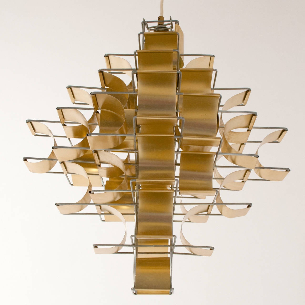 1970s production of the "Cassiope" lamp. Hard to find gold finish aluminium leaves on steel construction. Made in France. Featured in "1000 Lights" by Fiell, vol. 2pg. 206.