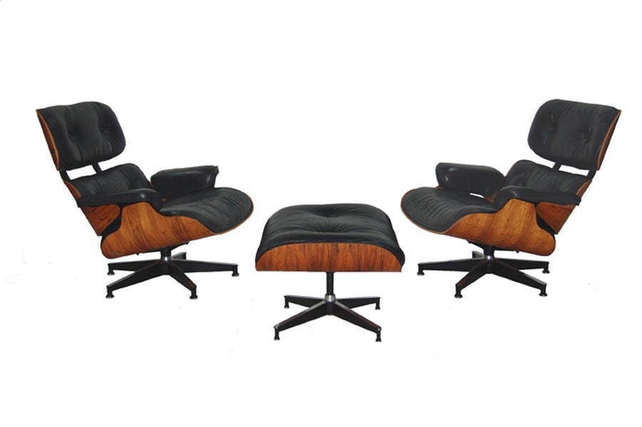 American Pair of Charles Eames Rosewood Lounges and Ottoman