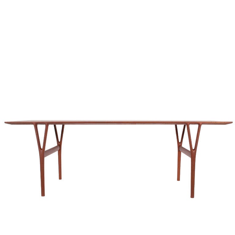 Coffee Table model number U55, teak top with solid Y shaped legs, cross bar stretchers.  Made by master cabinetmaker Peder Pedersen.  Retains label.