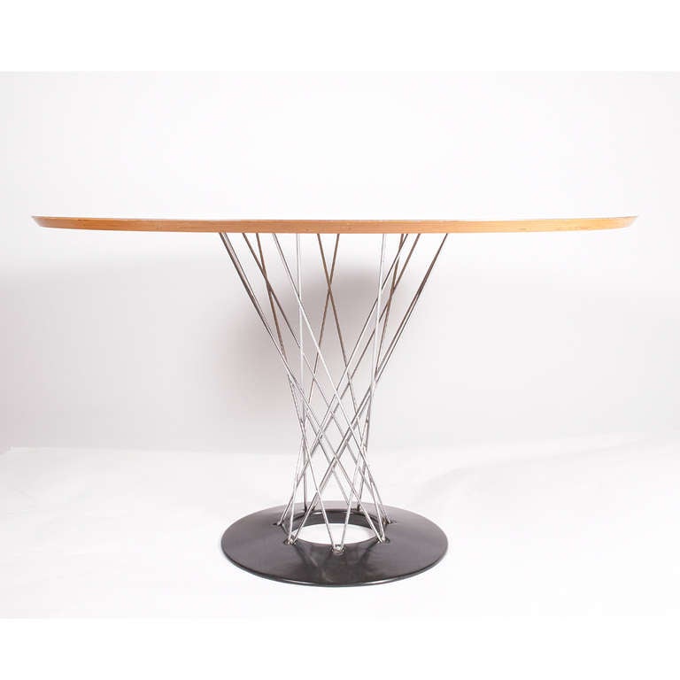 Original Noguchi dining table, white laminated baltic birch top with polished chrome crossed wire base attached to black painted metal ring base. Retains Knoll label.  Purchased in early 1970s by Knoll employee at Dallas showroom.