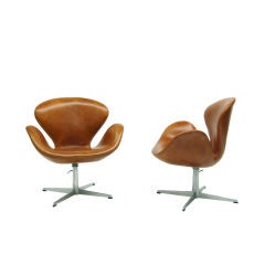 Pair of Adjustable Height Swan Chairs