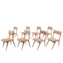 Used Carlo de Carli set of 8 chairs