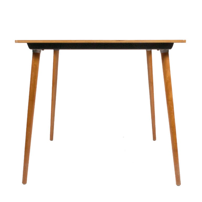 Hard to find model DTW-3 (detachable table wood legs), birch top with solid birch legs.  Made from 1945 - 1950.  Manufactured by Evans Products/Herman Miller.