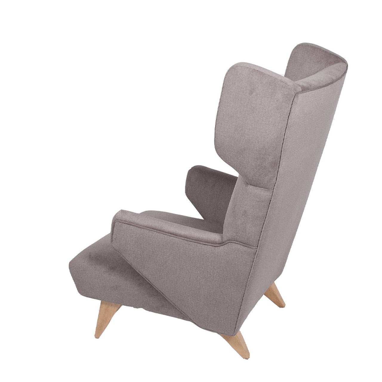 Rare high back version of Risom's chair design for Knoll. Small jutting arms, wing back with flattened tapering birch legs, new velveteen upholstered.