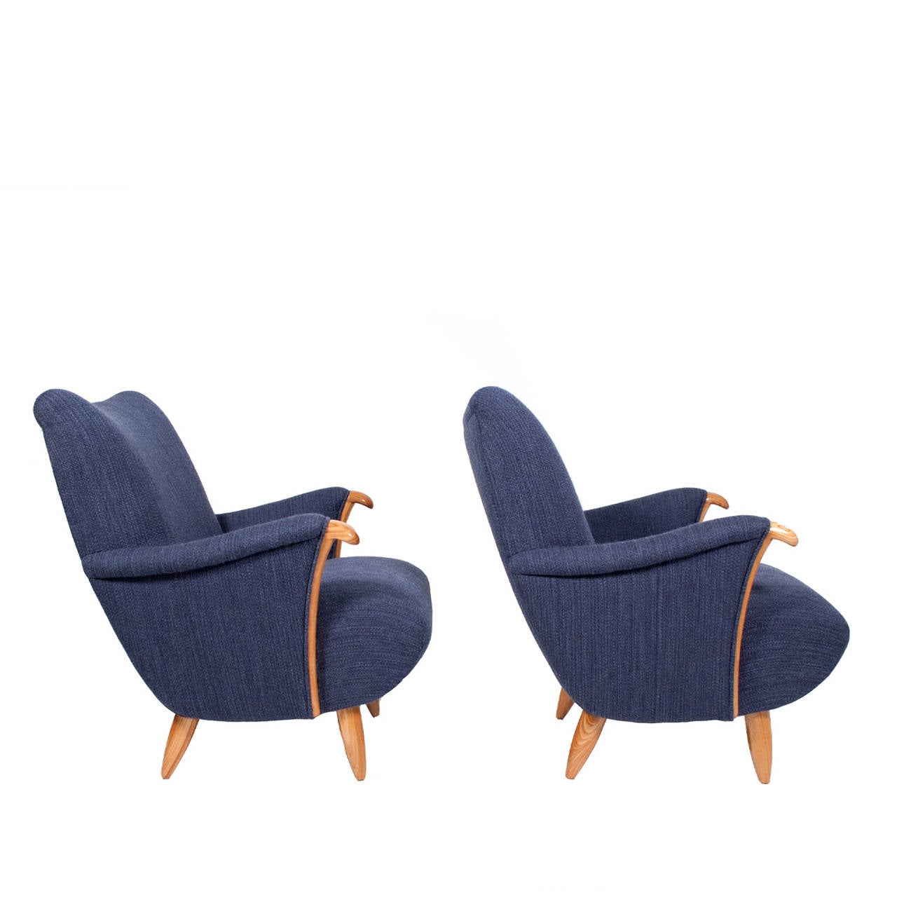 Pair of organic shaped easy chairs elmwood arms and cone shape legs, newly upholstered in 100% wool fabric from Designtex.