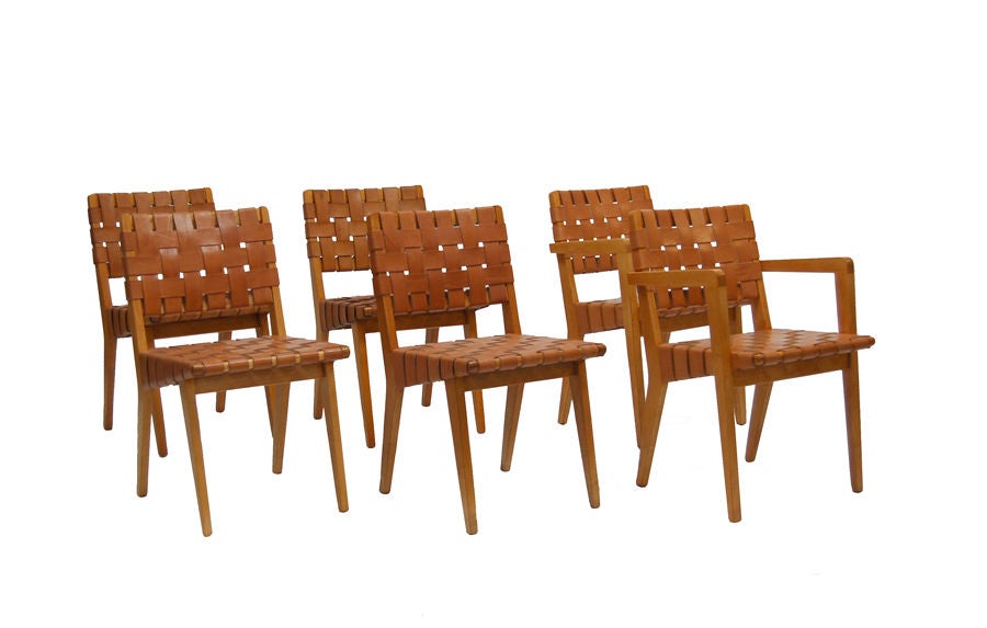 Set of early Knoll chairs, two rare armchairs and four side chairs. Solid birch frames and new rawhide leather webbing.