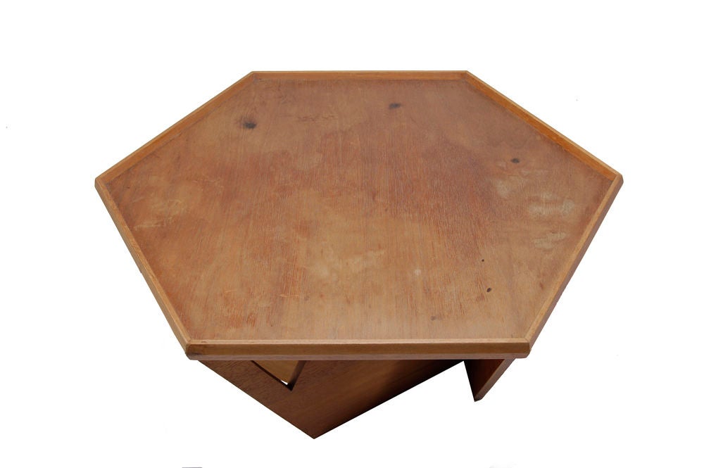 Solid mahogany hexagonal coffee table, custom made for the McCullough house in Wichita Falls, Texas. The twelve-sided house was designed with six examples of these tables; three as coffee tables and three with cushions to be used as ottomans. Made
