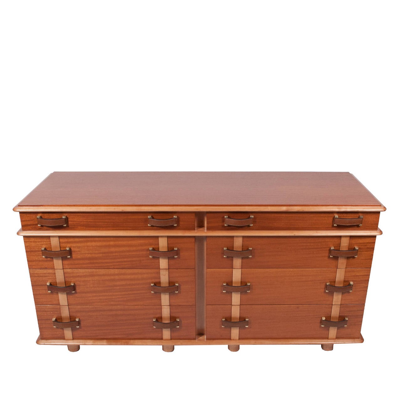 Rare double chest of drawers, model 1041B-160, in the Station Wagon series, mahogany case and drawer fronts with birch detail and legs. Leather and brass drawer pulls. Marked in drawer, Johnson Furniture Co. Marked on back with model number.