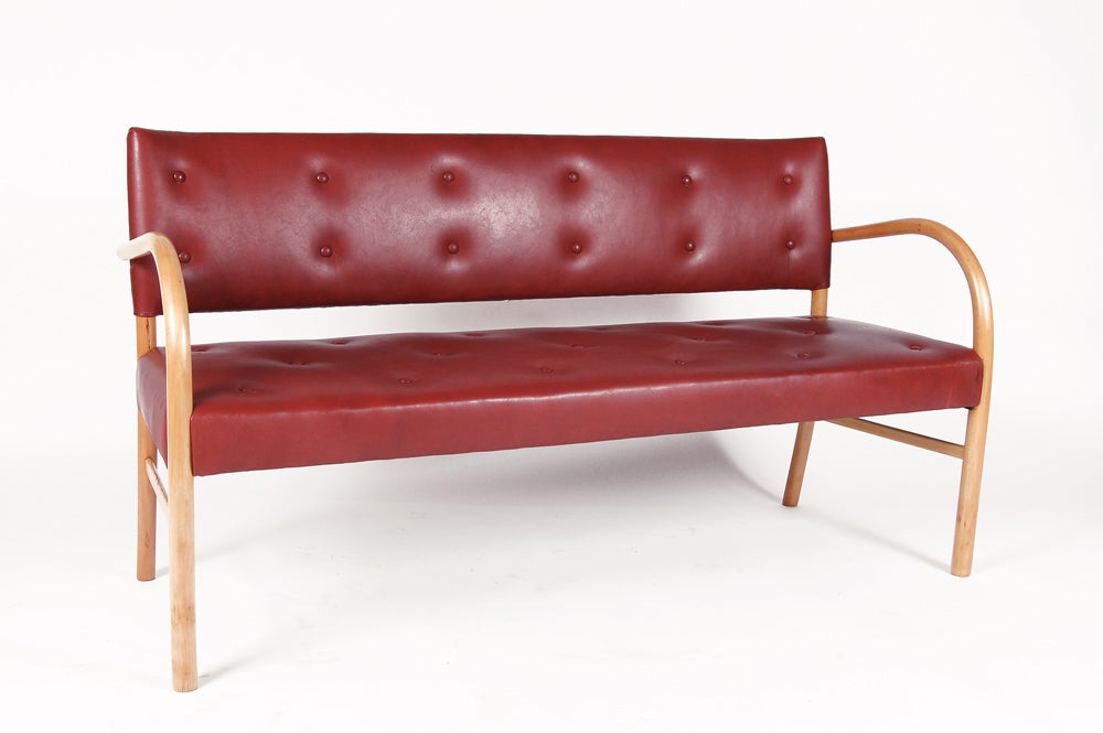 Rare, steam bent beech frame sofa upholstered in new leather. Restored frame. Previously owned by the National Museum of Denmark. Retains early metal label. Made by Fritz Hansen.